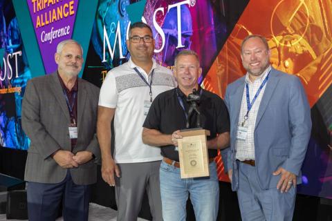 L-363 BM-ST William Mulconnery, second from right, accepts the 2023 Charles W. Jones Award on behalf of the lodge. Left to right are MOST Administrator Mark Garrett, IVP-GL Dan Sulivan, Mulconnery, and IP Tim Simmons.